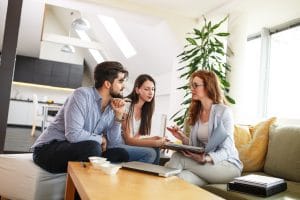 Insruance-Agent-Meeting-with-Couple-in-Home
