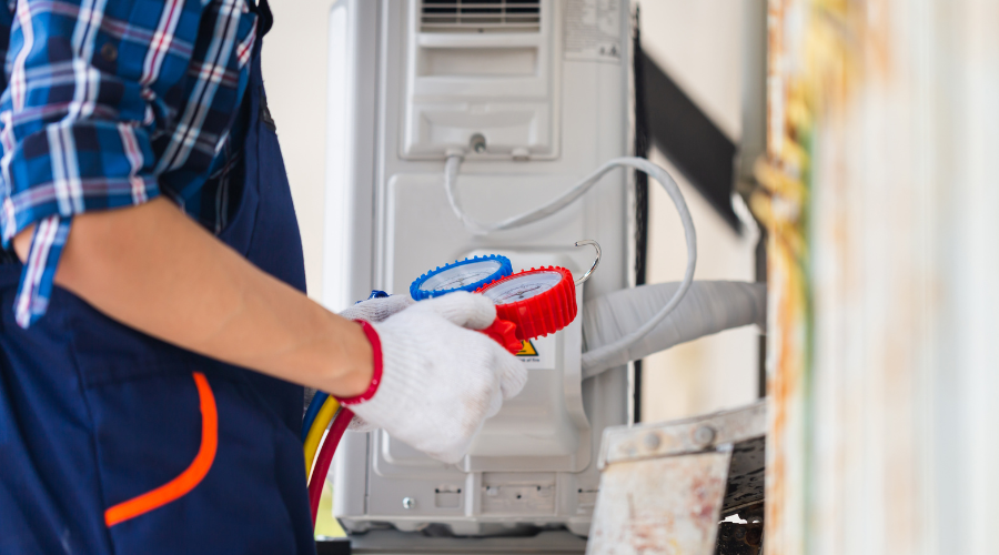 Air Conditioning Repair, Repairman fixing air conditioning system Air Conditioning Repair, Repairman fixing air conditioning system