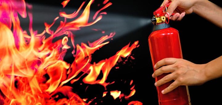 put out the fire with fire extinguisher