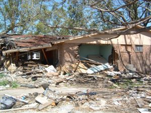 home reconstruction in Charlotte, NC - picture of house destroyed by Hurricane Katrina in 2005