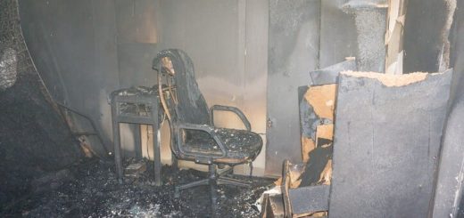 basement fire damage restoration - basement office covered in soot