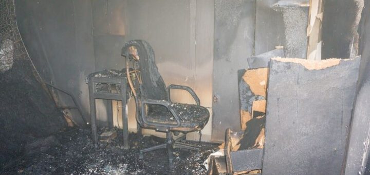 basement fire damage restoration - basement office covered in soot