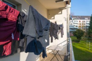 Clothes hanging on clothesline Remove-Musty-Odor-from-Clothes