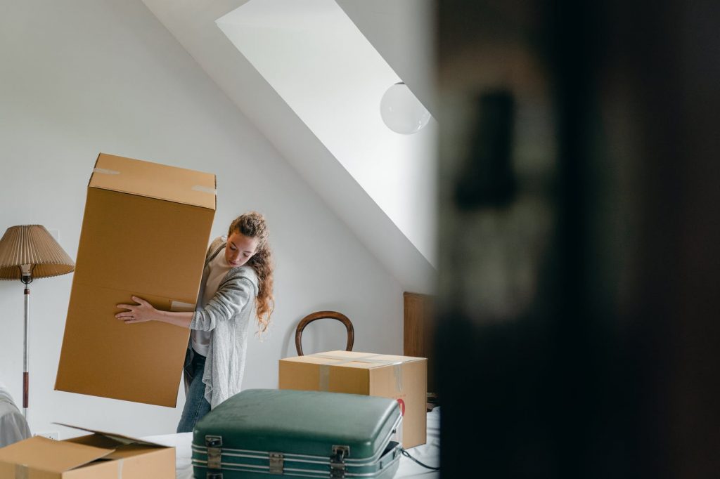 Woman Moving Big Boxes