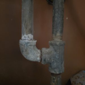 Pipe damage under sink - old kitchen pipes