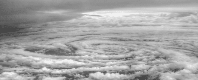 What weather conditions cause a bomb cyclone