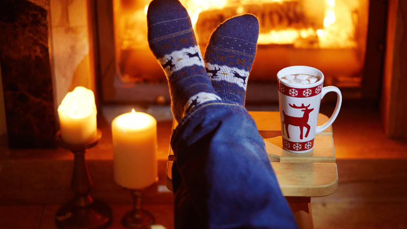 burning candles and fireplace holiday candles and fireplace